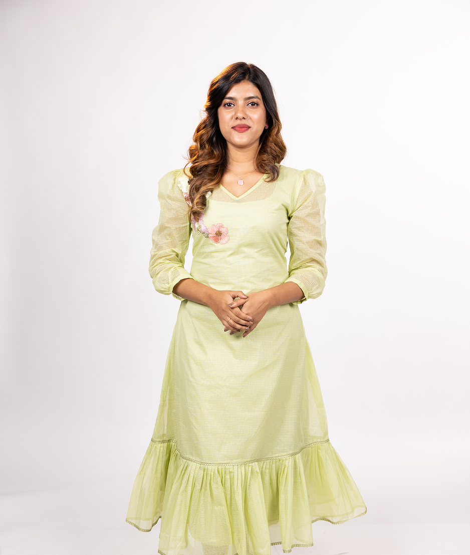 Modern brown saree with elegant draping style